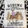 Riding solves most of my problems whiskey solves the rest - Whiskey and horse