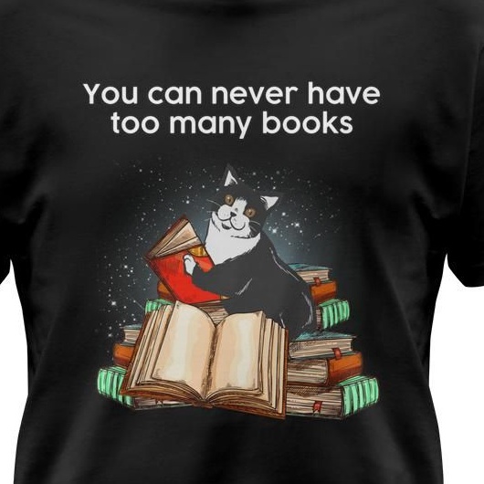 You can never have too many books - Cat reading books