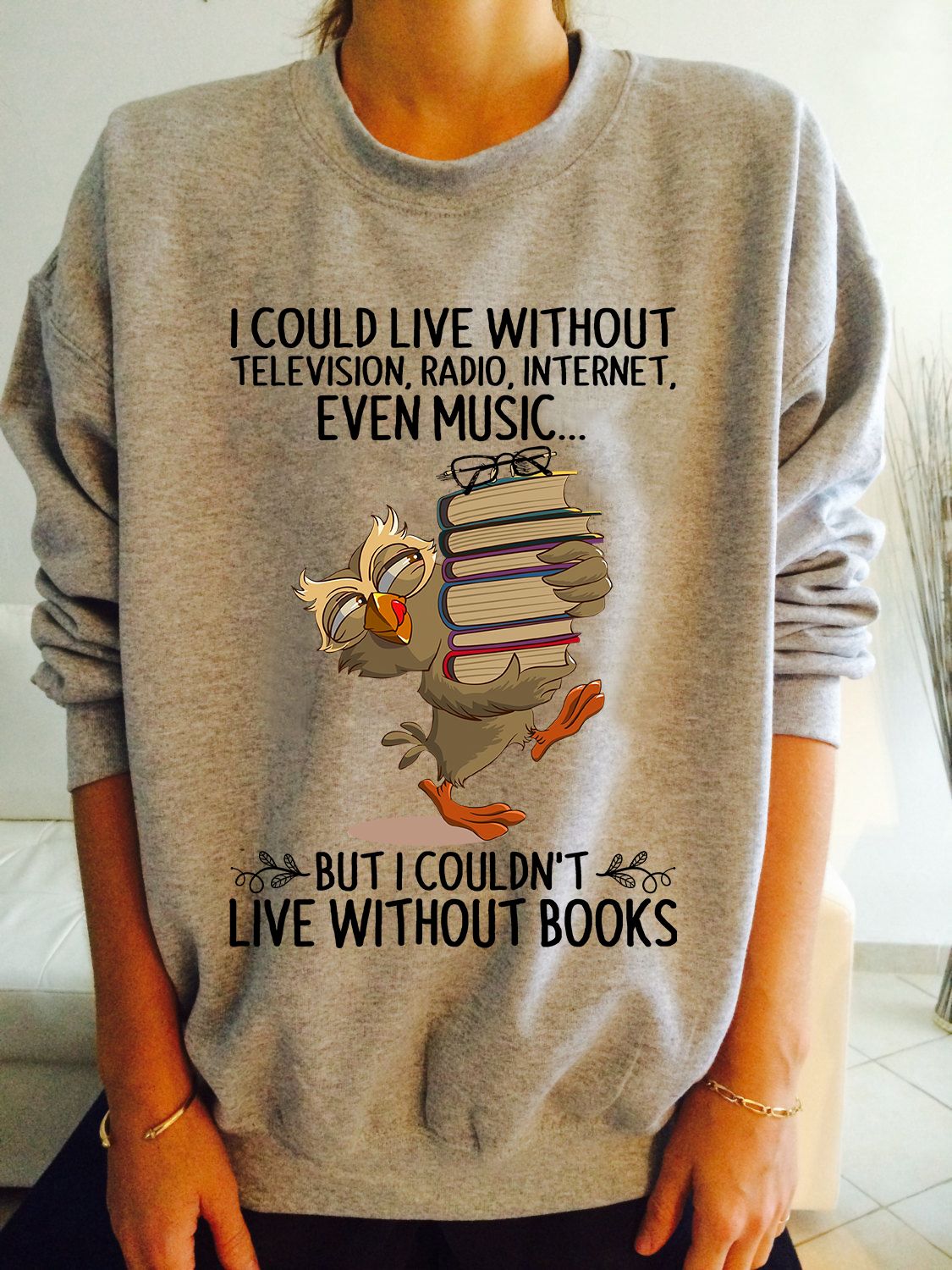 I could live without television, radio, internet but I couldn't live without books - Owl and book