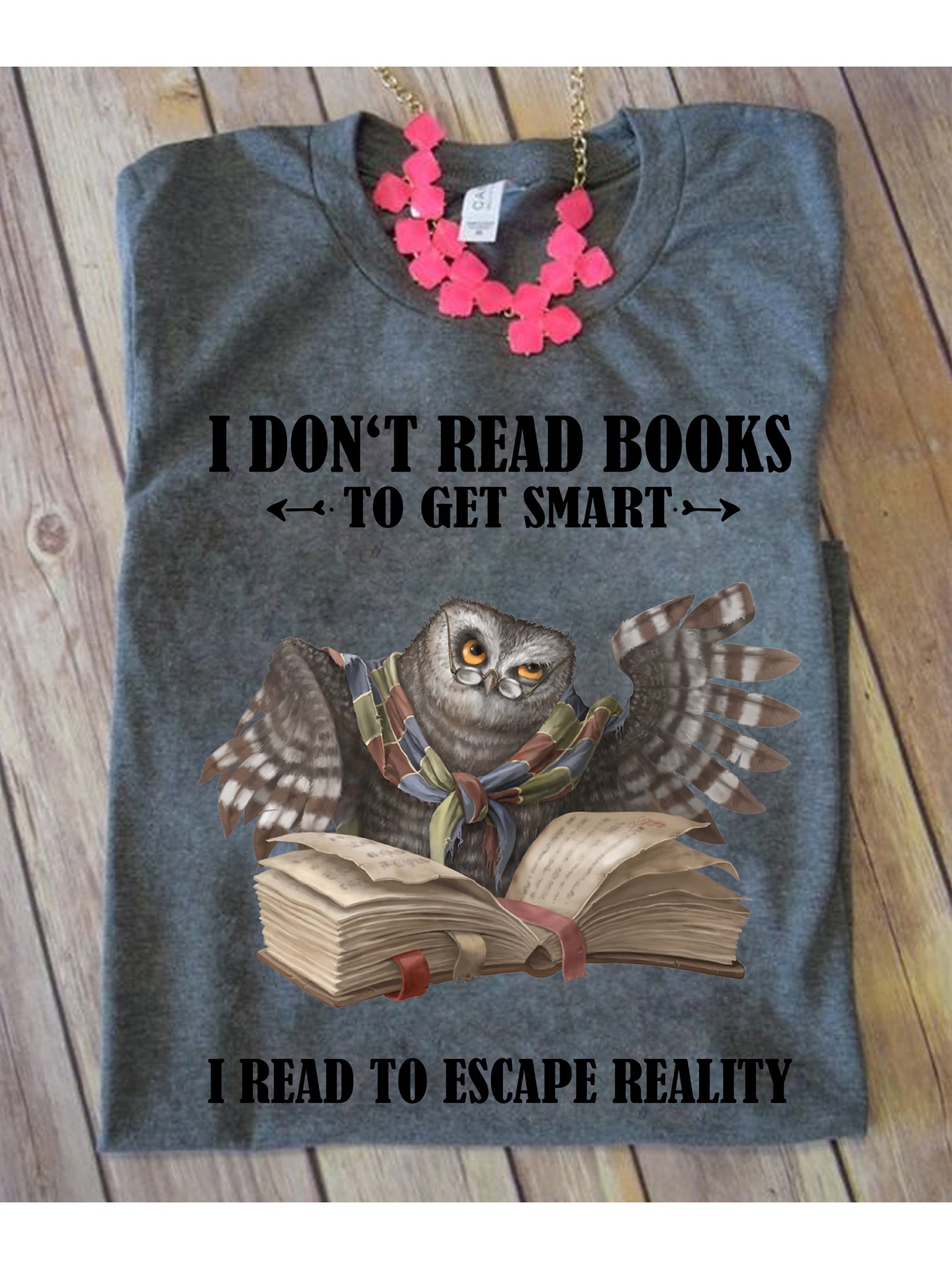 I don't read books to get smart I read to escape reality - Owl and books