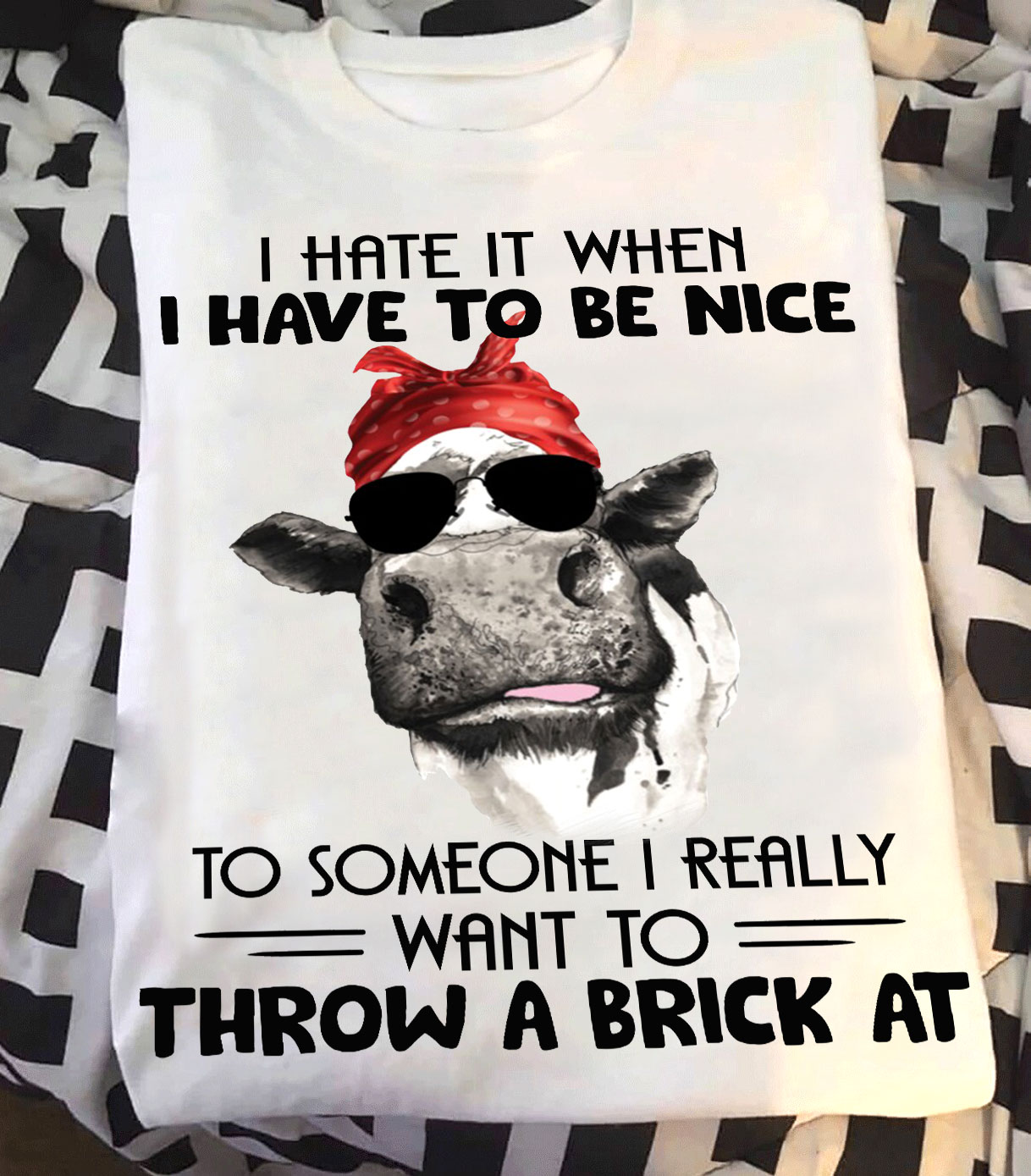 I hate it when I have to be nice to someone I really want to throw a brick at - Grumpy cow