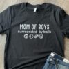 Mom of boys surrounded by balls - Football, basketball, baseball