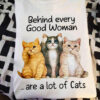 Behind every good woman are a lot of cats - Cat lover T-shirt