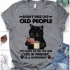 Don't piss off old people the older we get the less life in prison is a deterent - Cat reading book, coffee lover