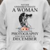 Never underestimate a woman who loves photography and was born in December