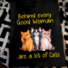 Behind every good woman are a lot of cats