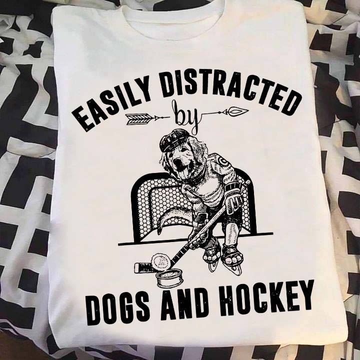 Easily distracted by dogs and hockey - Golden terrier, hockey lover