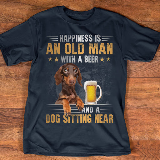 Happiness is an old man with a beer and a dog sitting near - Dachshund dog and beer
