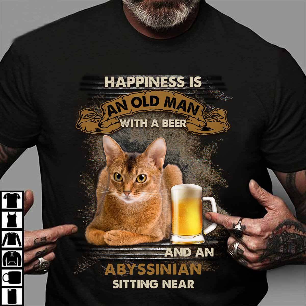 Happiness is an old man with a beer and an Abyssinian sitting near