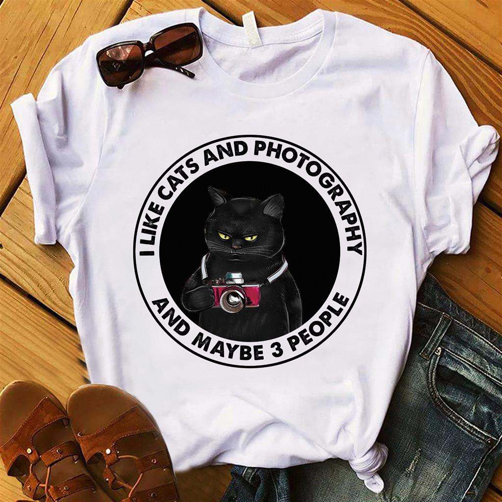 I like cats and photography and maybe 3 people - cat photographer