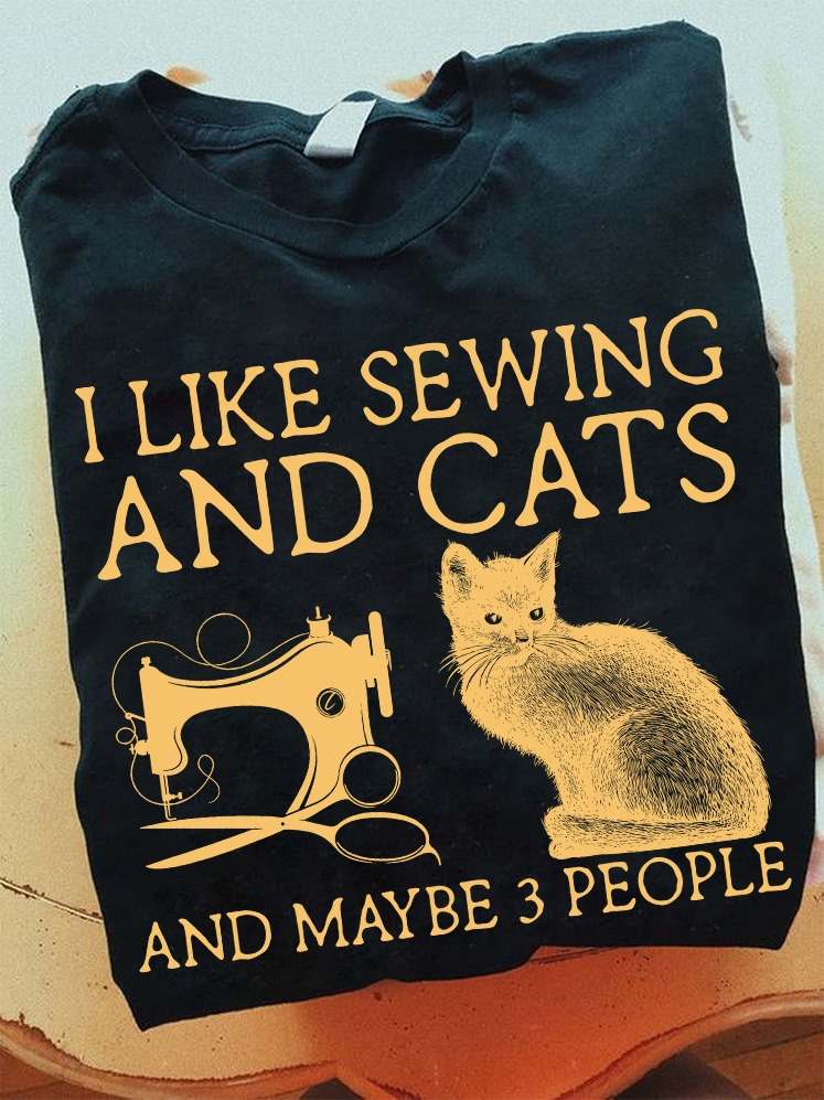 I like sewing and cats and maybe 3 people - Sewing machine