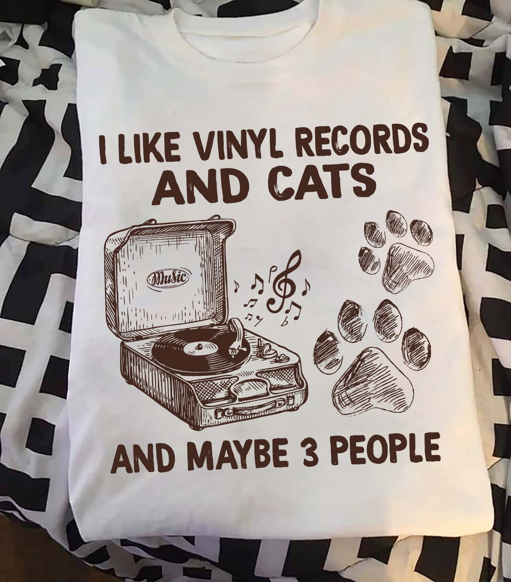 I like vinyl records and cats and maybe 3 people - Cat paw