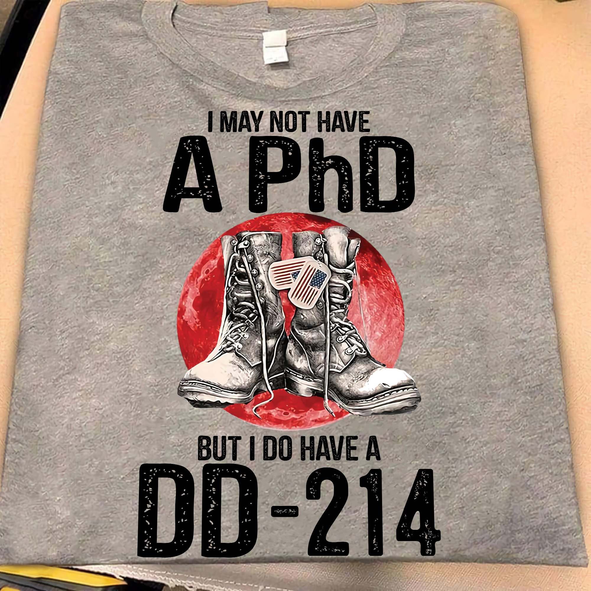 I may not have A PhD but I do have a DD-214 - Veteran shoes, American veteran