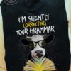 I'm silently correcting your grammer - Cow with book, book lover