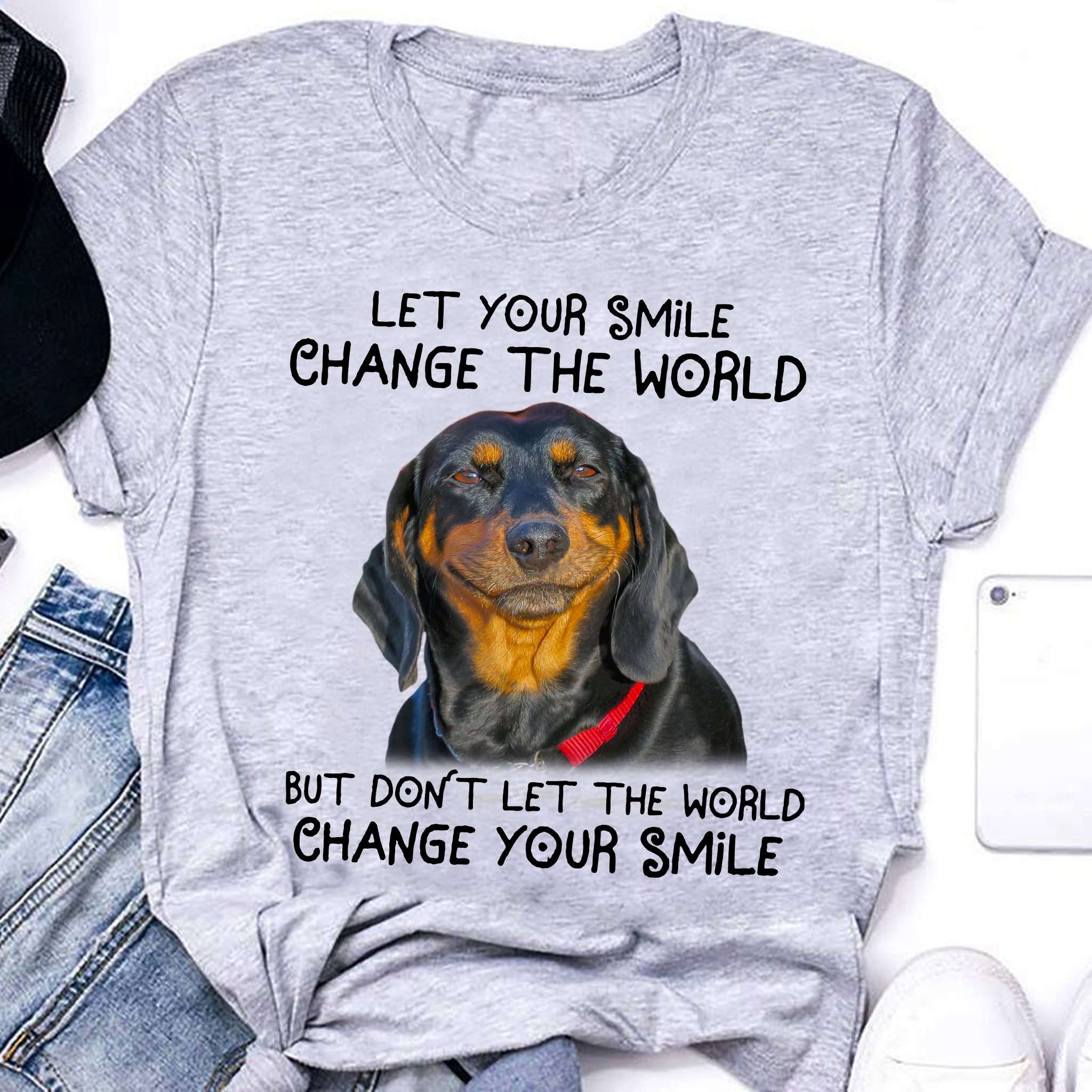 Let your smile change the world but don't let the world change your smile - Smiling Rottweiler dog