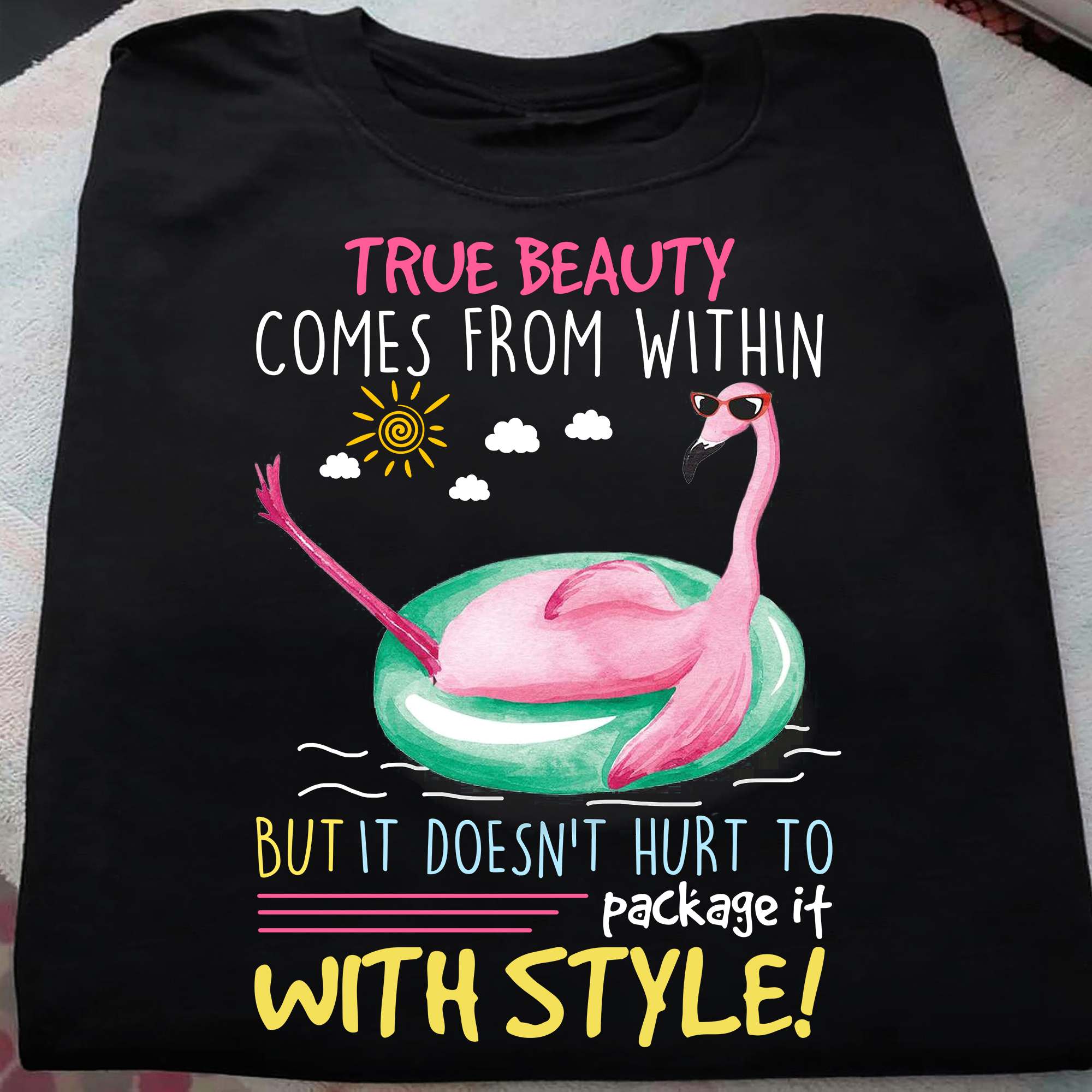 True beauty comes from within but it doesn't hurt to package it with style - Flamingo with sunglasses