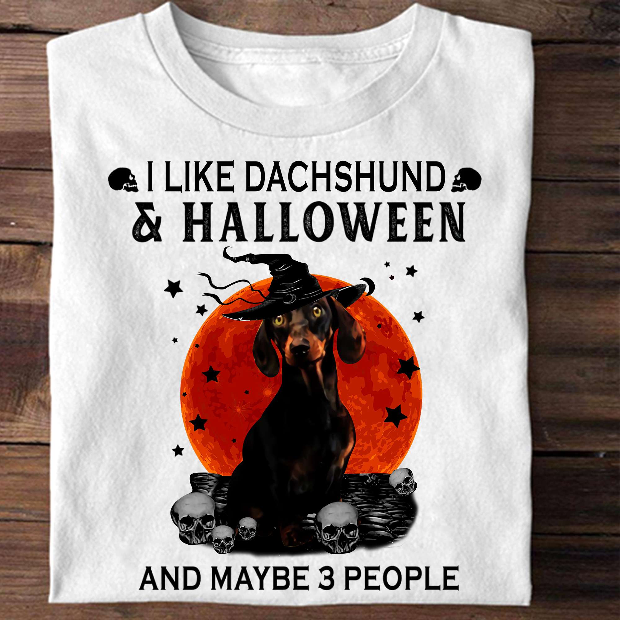 I like Dachshund and Halloween and maybe 3 people - Dachshund witch hat, halloween witch costume
