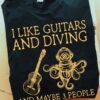 I like guitars and diving and maybe 3 people - Diving octopus, love playing guitar