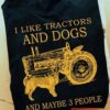 I like tractors and dogs and maybe 3 people - Golden dog, tractor driver