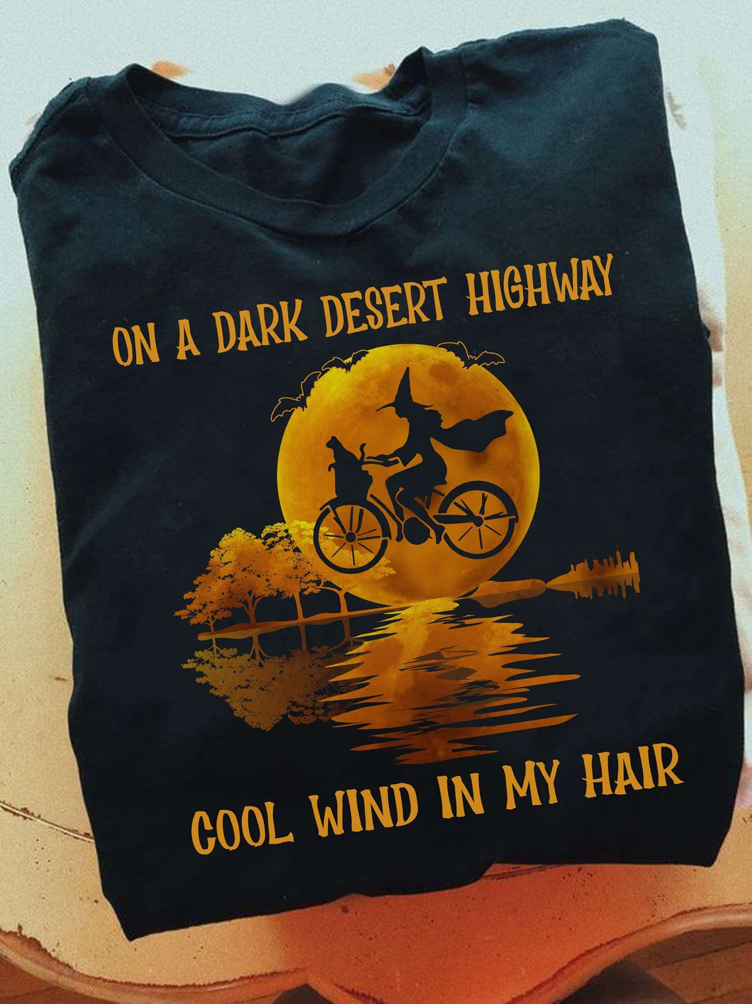 On a dark desert highway cool wind in my hair - Halloween witch biker, witch riding bicycle