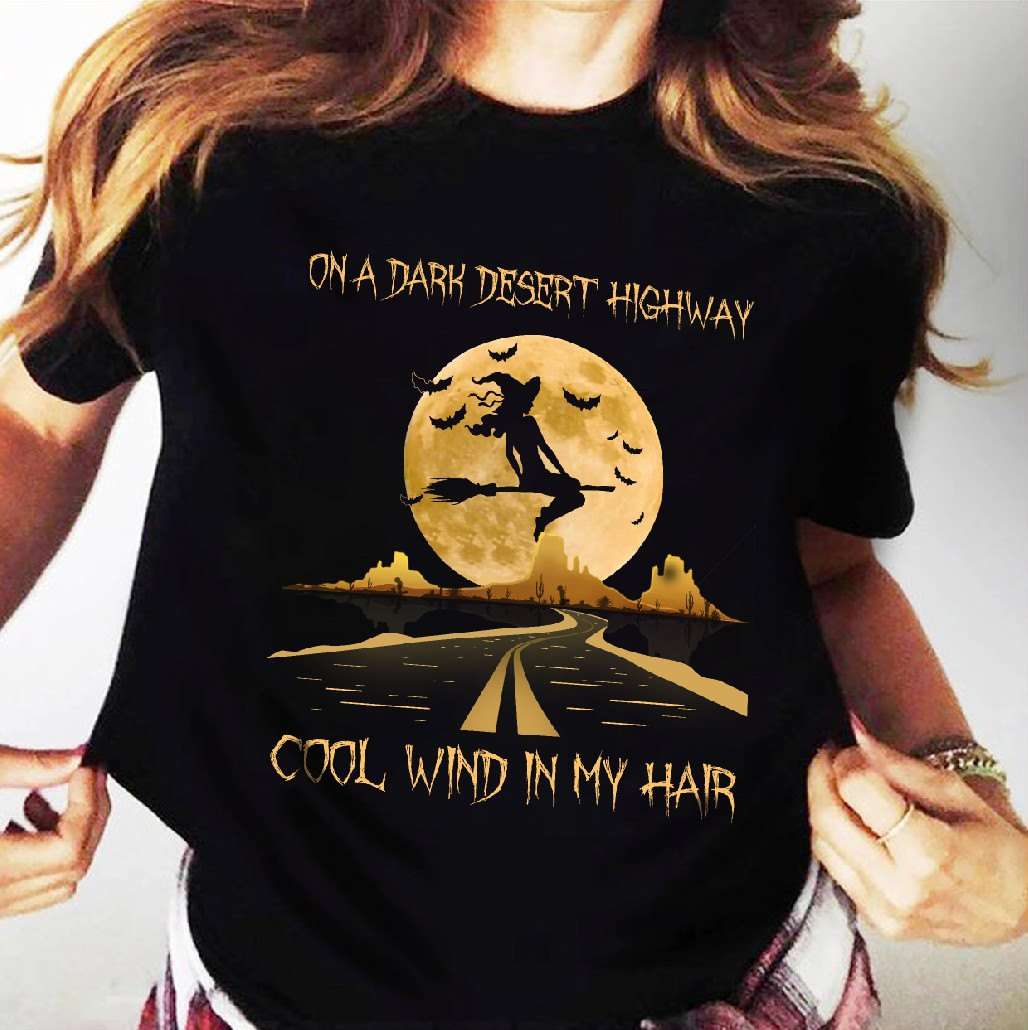 On a dark desert highway, cool wind in my hair - Halloween witch broom