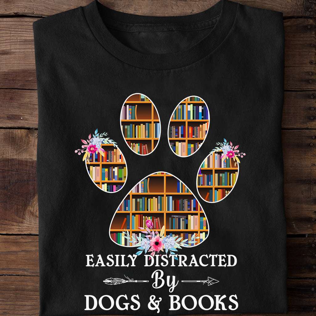 Easily distracted by dogs and books - Reading book the hobby, dog paws and books