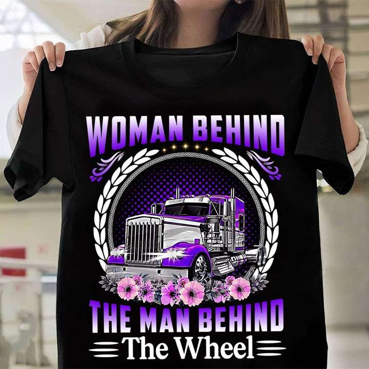 Woman behind the man behind the wheel - Truck driver