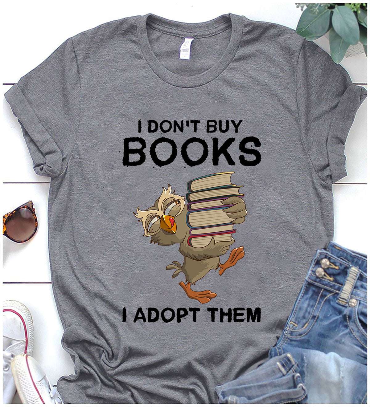 Book Owl, The Bookaholic - I don't buy books i adopt them