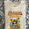 A day without reading is like a day without sunshine - Girl reading book