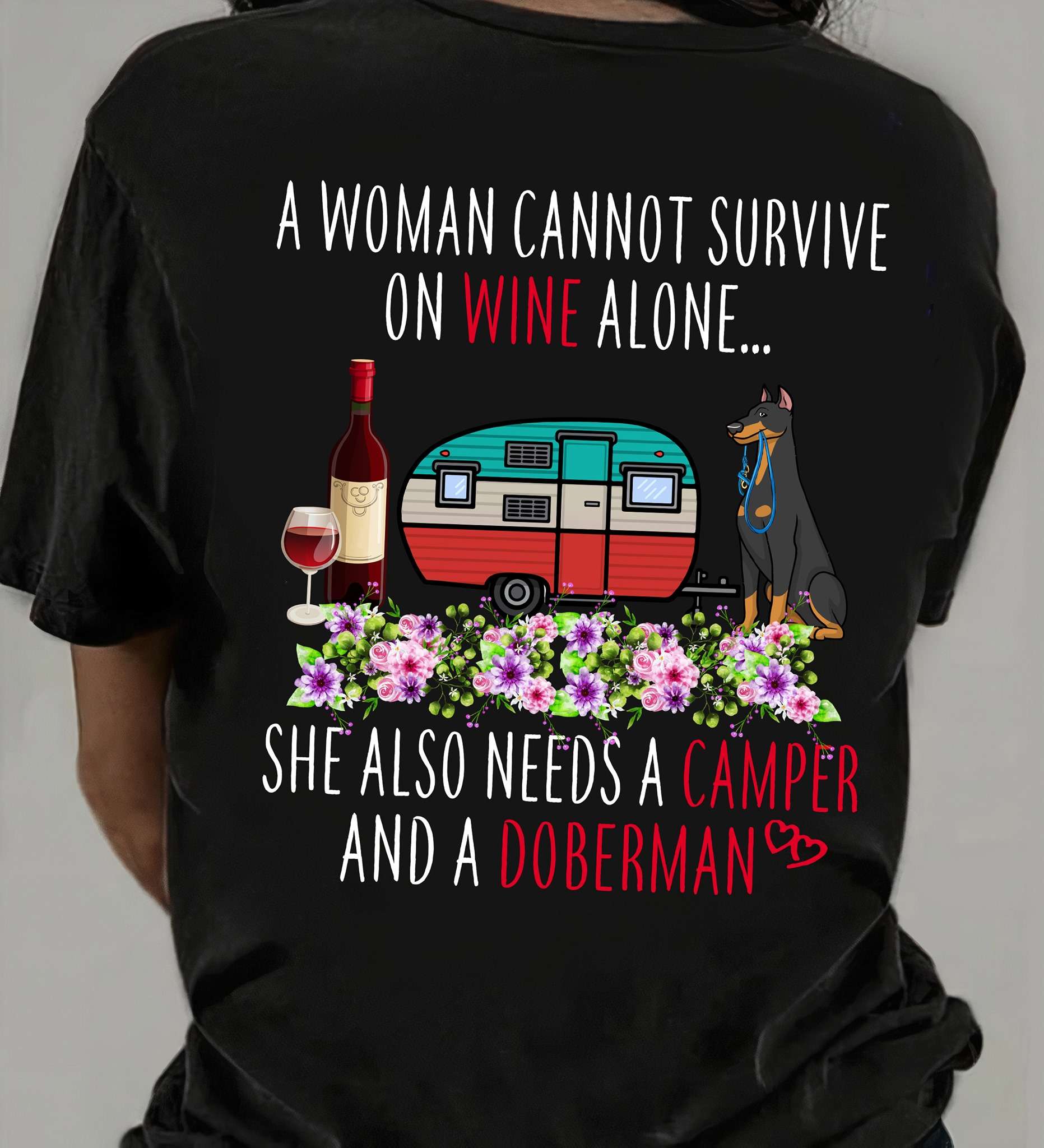 A woman cannot survive on wine alone she also needs a camper and a Doberman - Doberman dog and wine