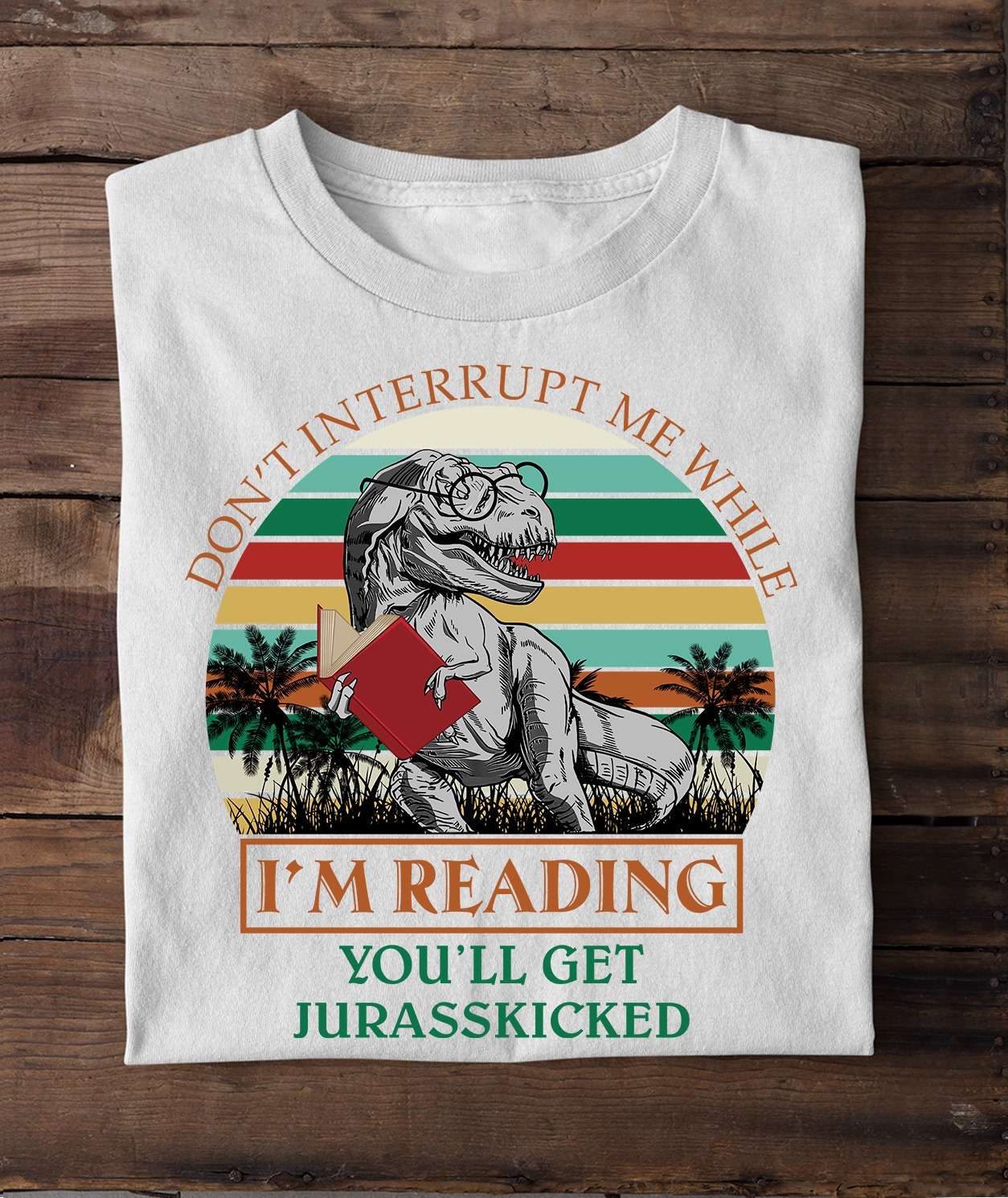 Don't interrupt me while I'm reading you'll get jurasskicked - T-rex reading books
