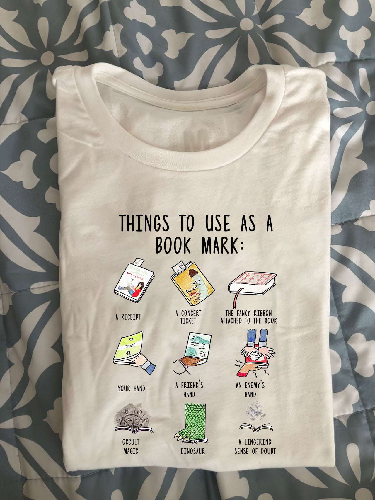 Gift For Bookaholic - Things to use as a book mark: A receipt, a concert ticket, the fancy ribbon attached to the book, your hand, a friend's hsnd