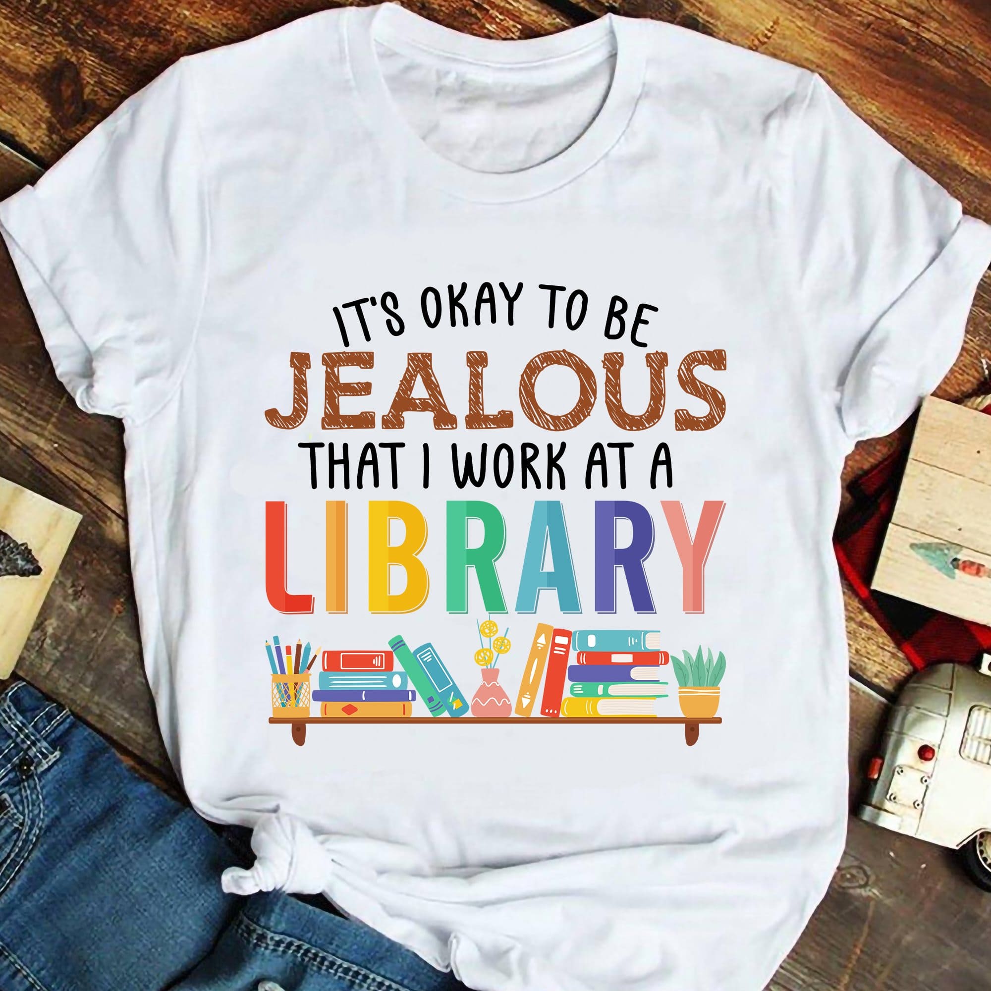 Bookshelf graphic t-shirt - It's okay to be jealous that i work at a library