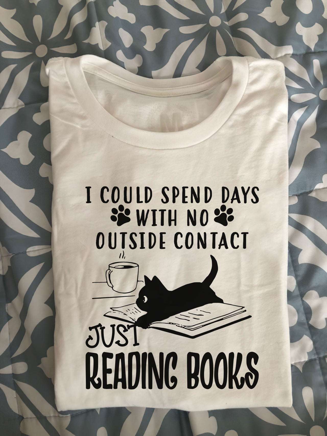 I could spend days with no outside contact just reading books - Black cat reading books, book and coffee