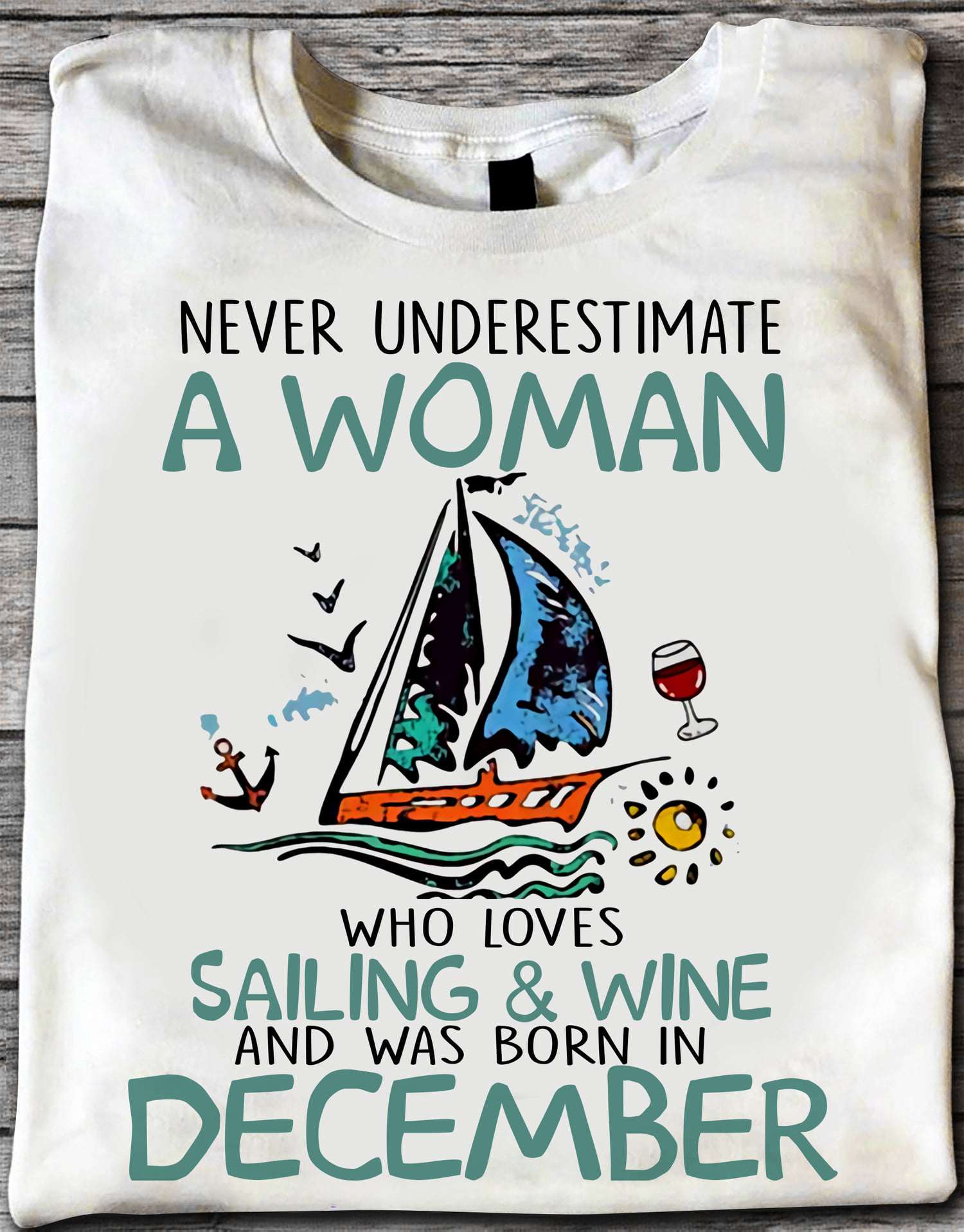Never underestimate a woman who loves sailing and wine and was born in December - Woman go sailing