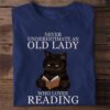 Black Cat Book - Never underestimate an old lady who loves reading