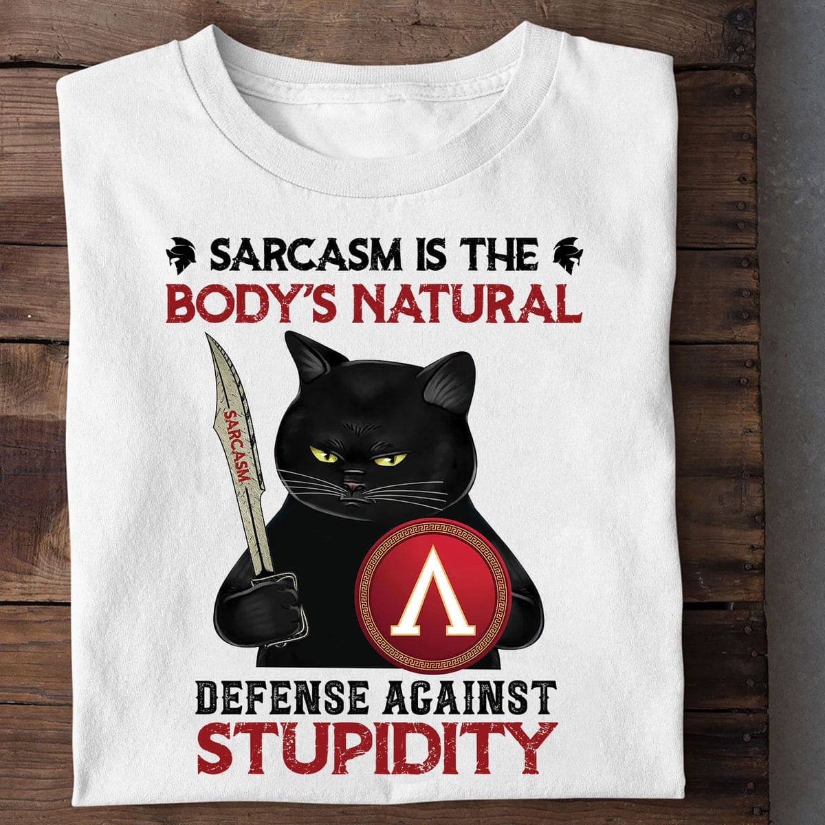Black Cat Spartan Shield - Sarcasm is the body's natural defense against stupidity