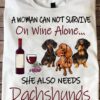 Wine Dachshunds - A woman can not survive on wine alone she also needs a dachshunds
