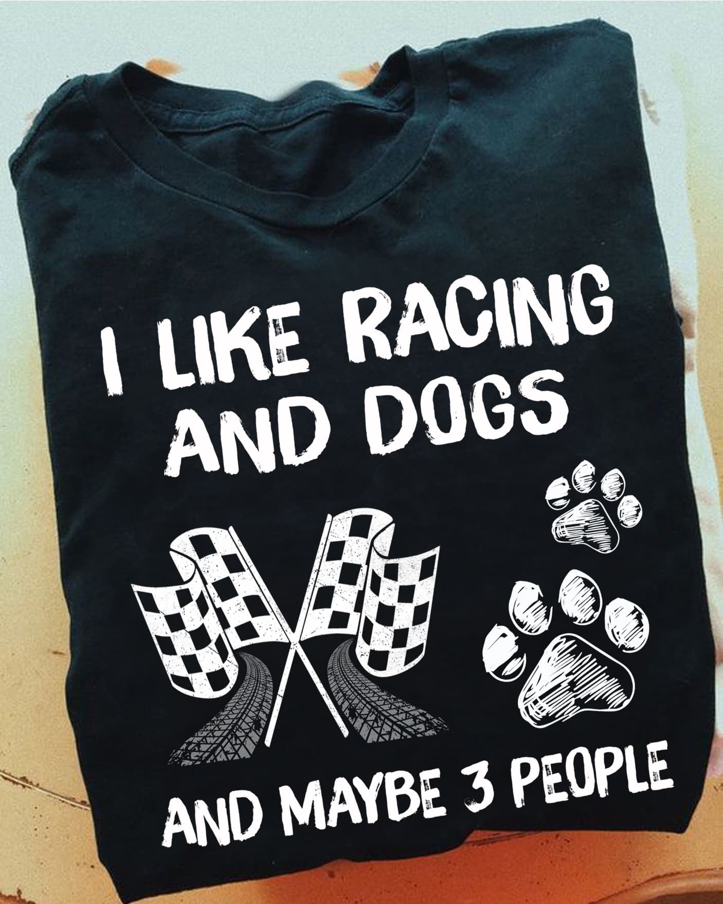 I like racing and dogs and maybe 3 people - Dog footprint, racing flag graphic T-shirt