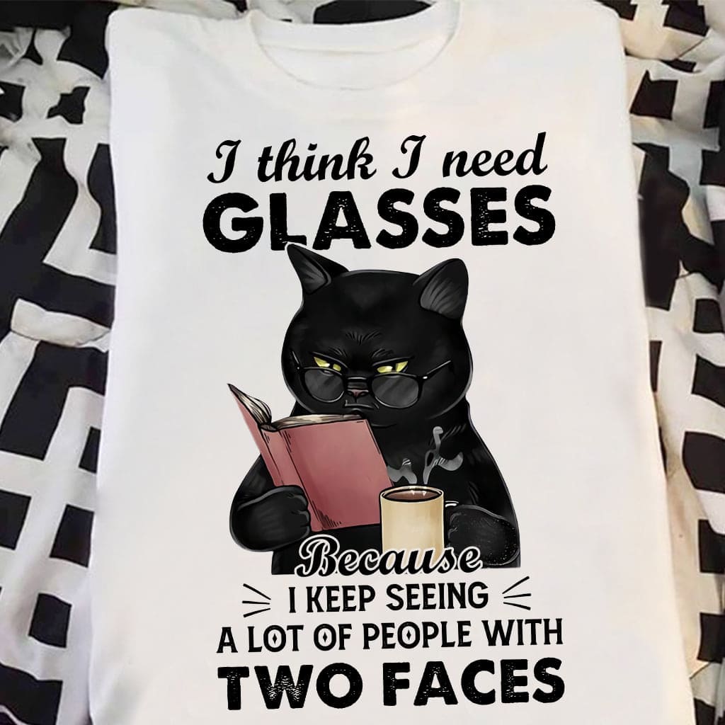 I think I need glasses because I keep seeing a lot of people with two faces - Black cat reading book, book and coffee