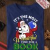 It's the most wonderful time for a book - Santa Claus and book, Reading book on Christmas