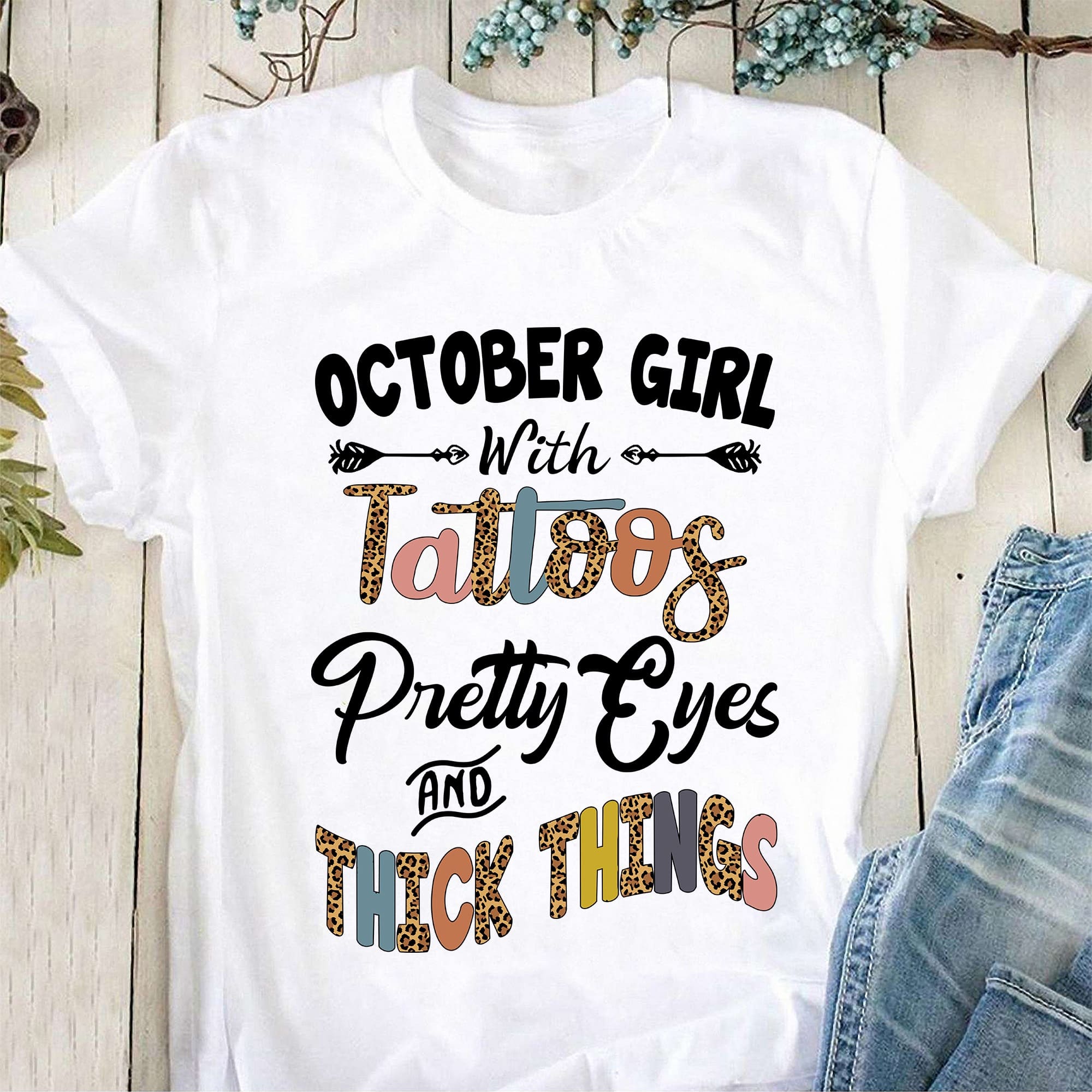 October girl with tattoos, pretty eyes and thick thighs