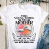 It takes a strong woman to be a mother but it takes the strongest one to be mother of a child with wings - Mother's day T-shirt