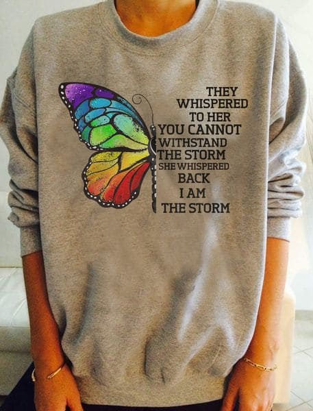They whisper to her you cannot withstand the storm, she whispered back I am the storm - Strong woman, butterfly graphic T-shirt